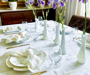 Transform your table with a gold rectangular tablecloth, capturing the essence of spring for a touch of elegance in any setting.