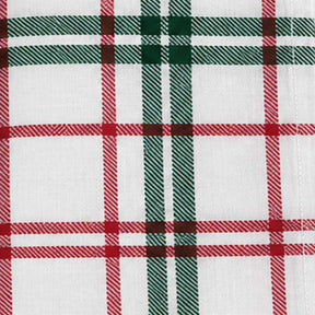 White fabric with red and green tartan plaid pattern
