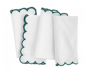 Modern green napkin for dining setup, neatly folded cloth design