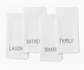 White embroidered cotton napkin with subtle white stitching classic minimalist dinner napkin for elegant table decor.