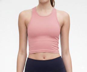 Pink women’s workout tank top made from soft cotton blend fabric, stylish yoga tank top for women for fitness routines and daily wear