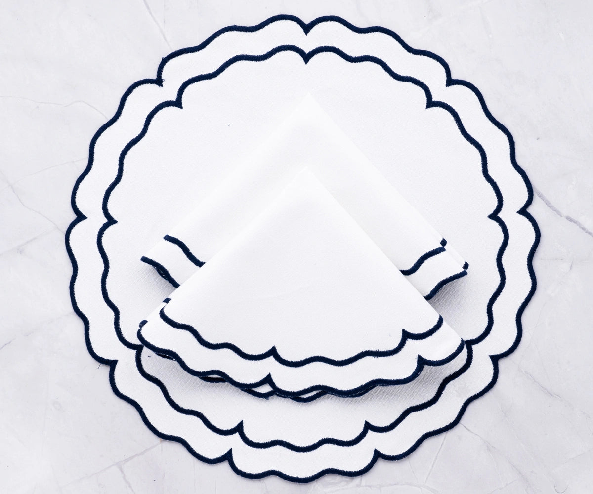 Durable woven cotton placemats featuring navy and white accents