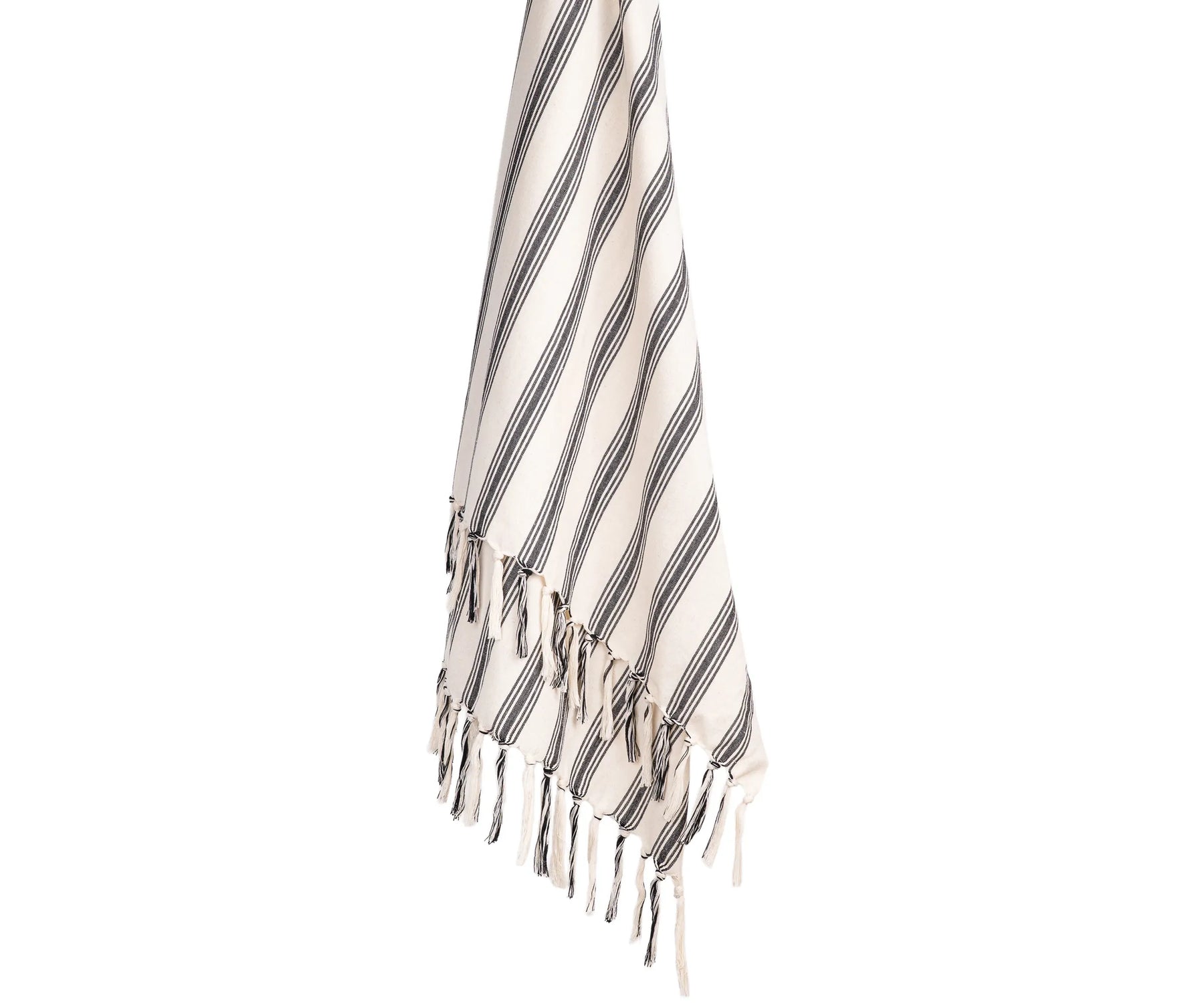 Soft cotton throw blanket featuring modern stripes and fringe, ideal for everyday home décor