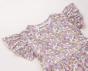 Adorable pink floral cotton dress for baby girls, designed as a breathable sleeveless outfit ideal for warm weather and daily wear, with a timeless charm inspired by vintage baby clothes styles.