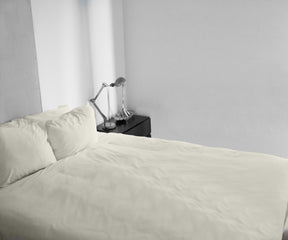 Fitted cotton sheet designed for a luxurious and snug fit on your bed.