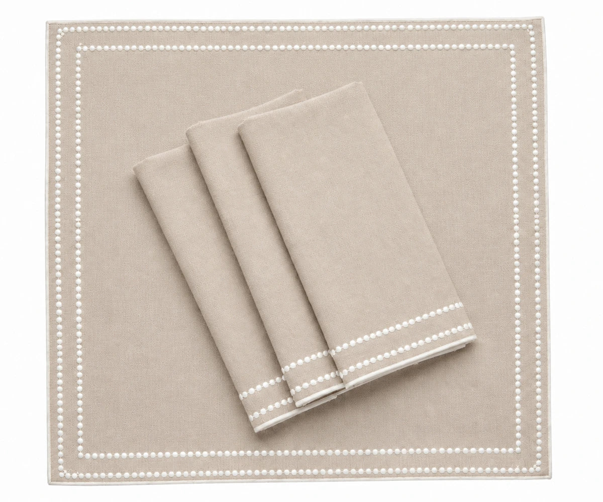 Dot embroidered cotton napkins for elegant everyday dining and table settings
