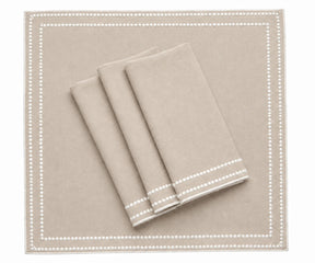 Dot embroidered cotton napkins for elegant everyday dining and table settings
