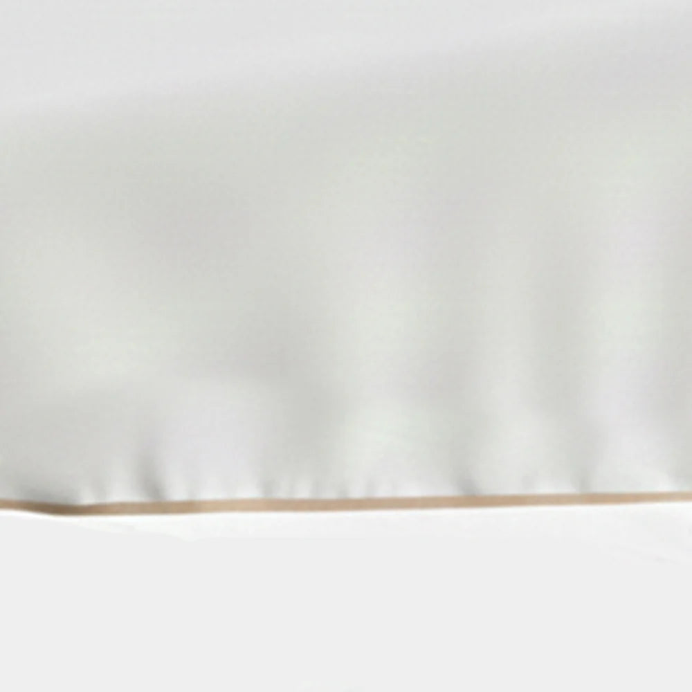 Set of white cotton placemats with beige trim