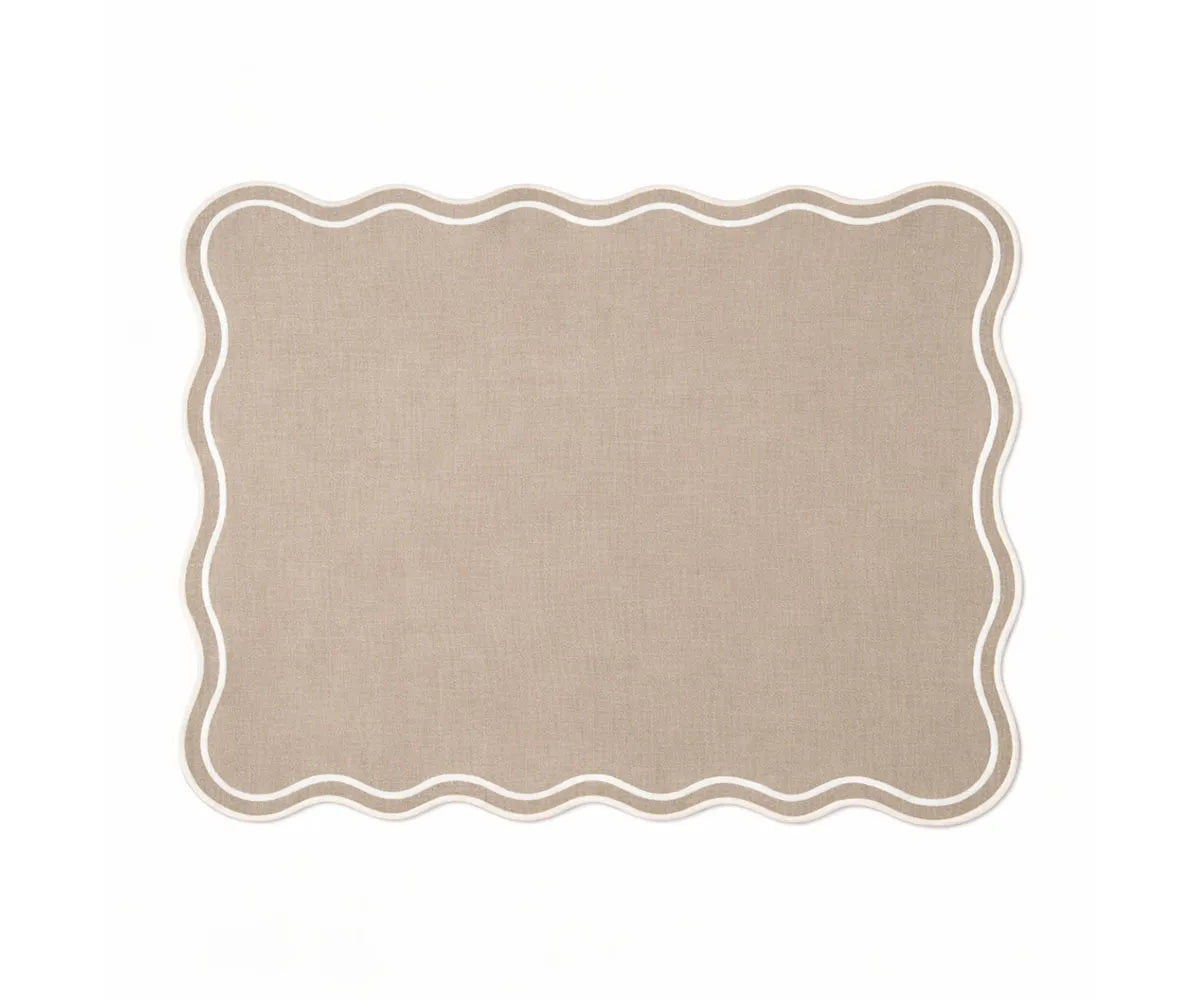 Decorative cotton placemats for dining table featuring scalloped white edges and timeless rectangle shape
