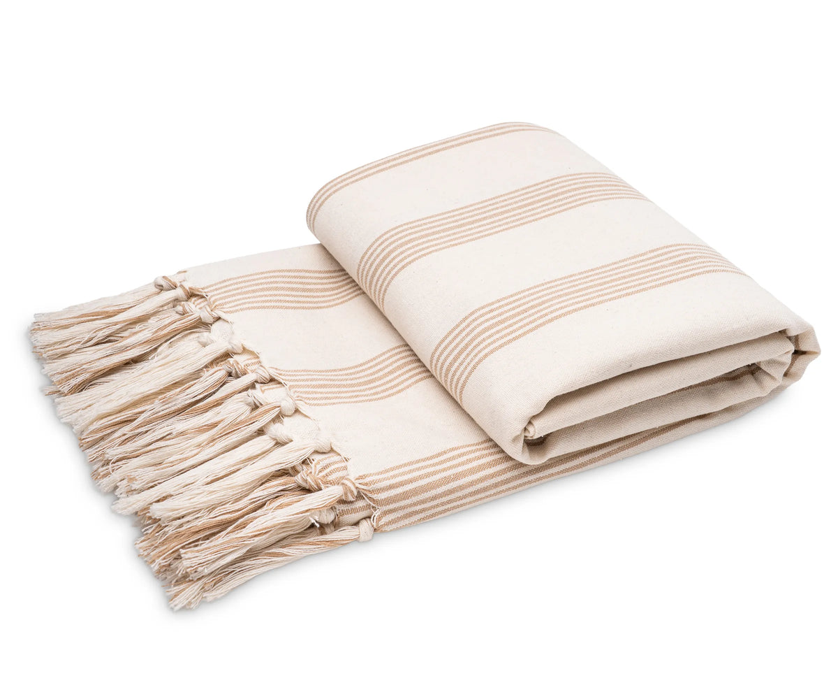 Soft cotton stripe throw with a lightweight feel, finished with decorative fringe, ideal for sofas or beds