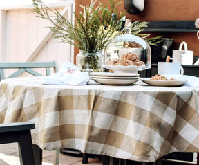 Round Cotton Tablecloths - A round white linen tablecloth for a timeless appeal.