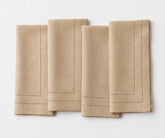 Soft beige linen table napkins with premium double hemstitch, perfect for farmhouse dining, bridal showers, holiday meals, and everyday use.