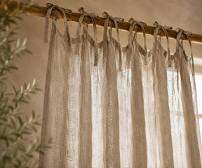 Beige Tie Top Linen Curtains crafted from natural European flax linen for a warm, inviting space. Light filtering linen curtain panels for farmhouse, minimalist, and rustic interiors.