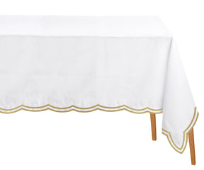 Beige cotton tablecloth featuring scalloped edges, styled for effortless elegance in any setting