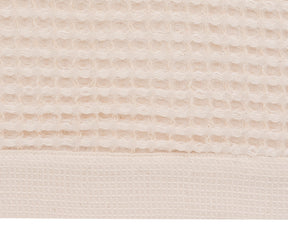 Plush natural cotton waffle towel for spa, home, gym, or travel