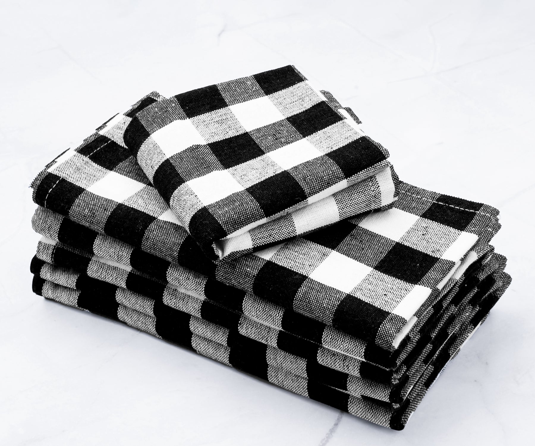 Checkered napkins, a versatile choice for casual or formal dining.
