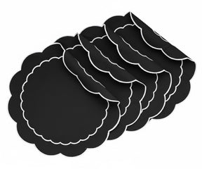 Black circular placemat featuring white stitched trim edge