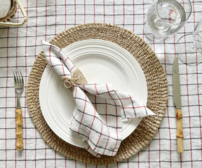 Soft, durable, and highly absorbent linen napkins in a chic red and black design.