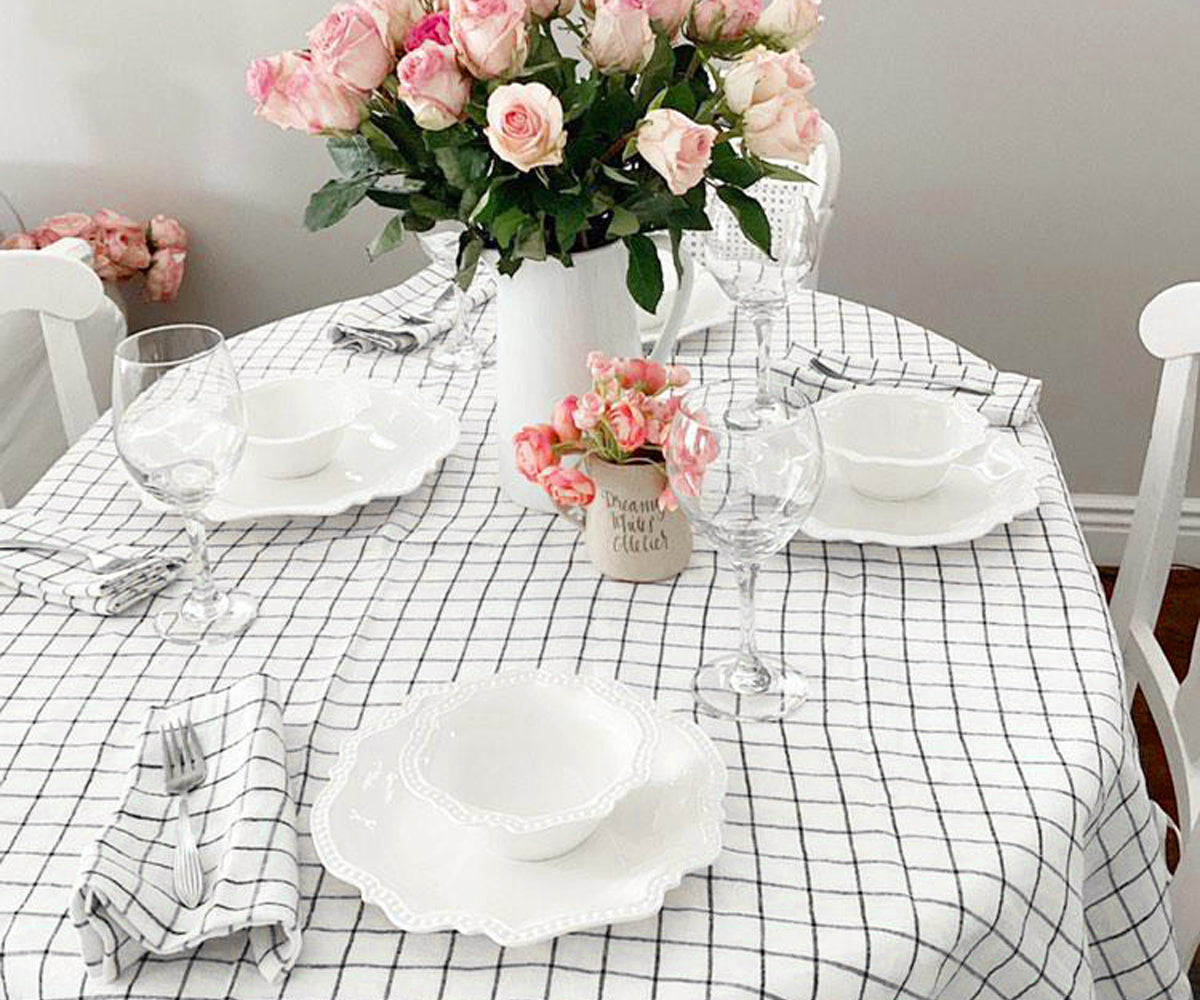 Introducing black and white stripe tablecloths, including round options, in a variety of sizes for your preference.