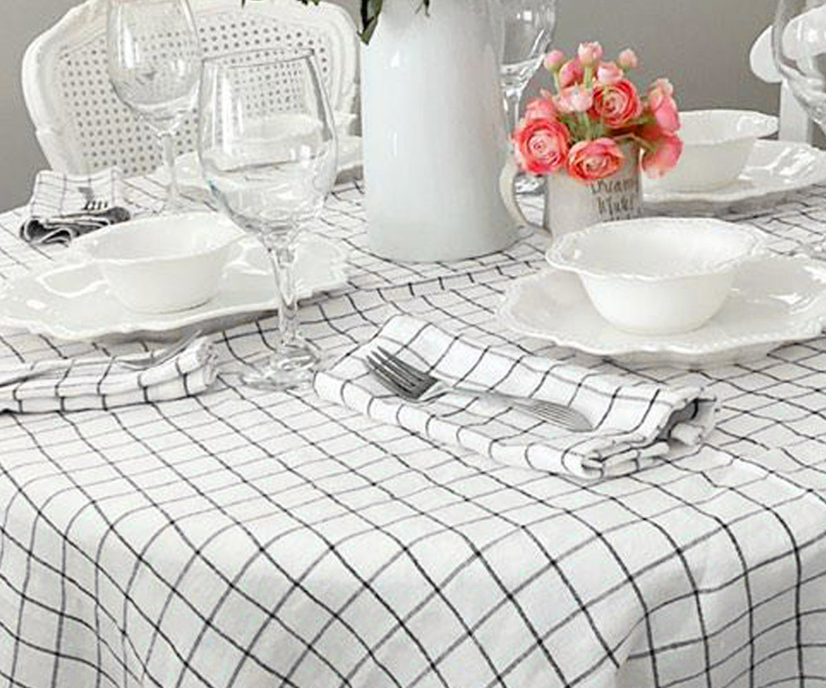Explore our collection of black and white stripe tablecloths with different sizes, including rounds for your tables.