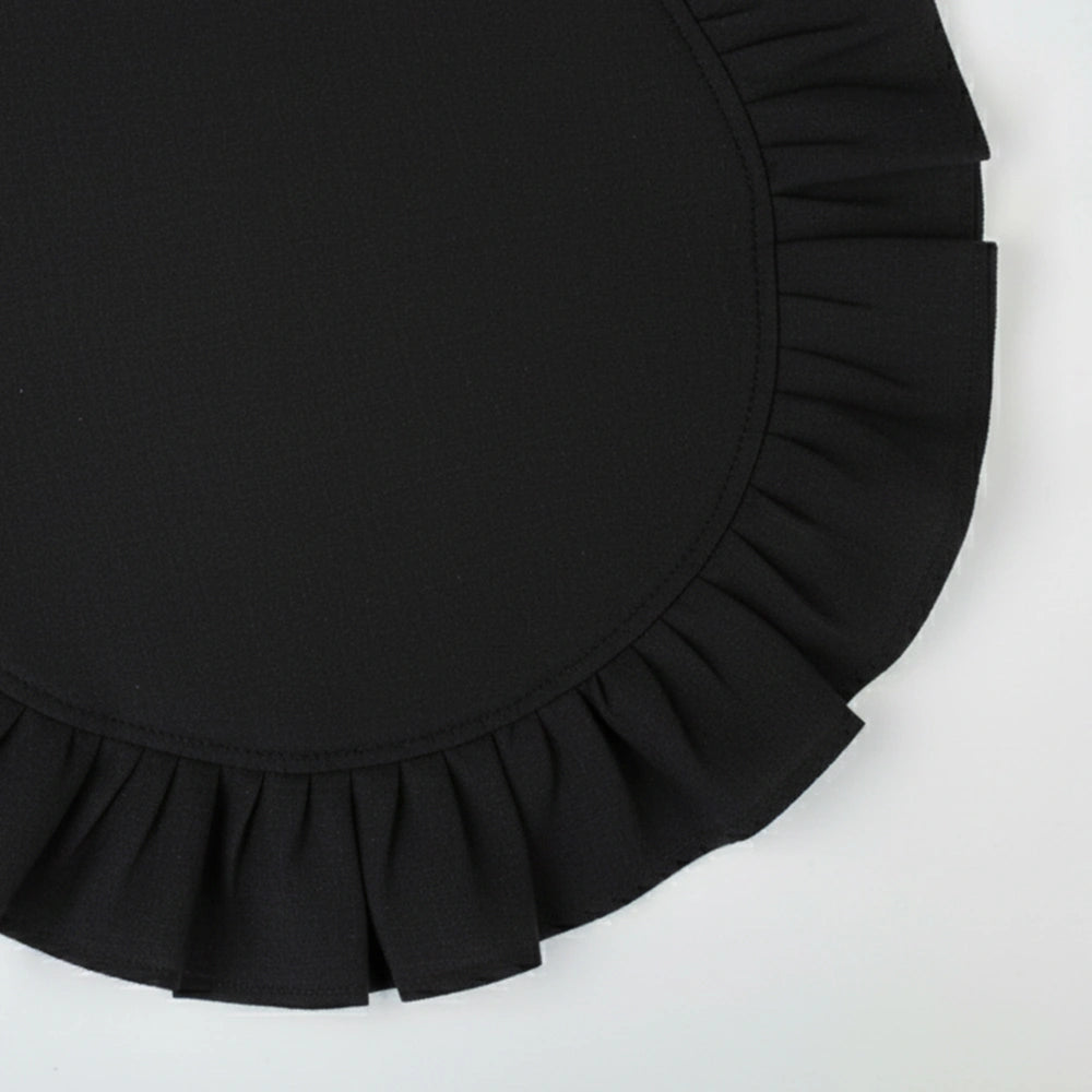 Elegant black cotton cloth napkins with ruffle edges, reusable table linens for stylish everyday or event use.