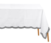 Sleek black cotton tablecloth enhancing the drama and elegance of a modern dining space