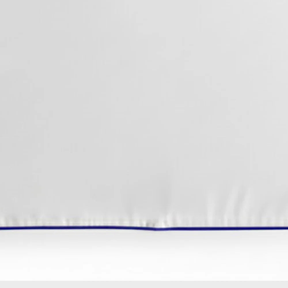 Set of white cotton placemats with blue piping