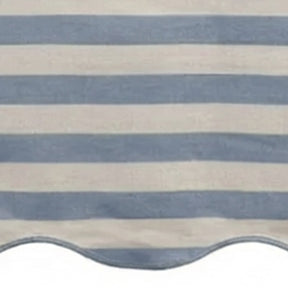 Blue and white cabana striped table runner with a scalloped edge detail.