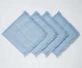 Blue cotton cloth napkins with decorative fringe edges, made from 100% soft and durable cotton fabric. Reusable eco-friendly napkins ideal for everyday dining, weddings, dinner parties, and elegant table settings.