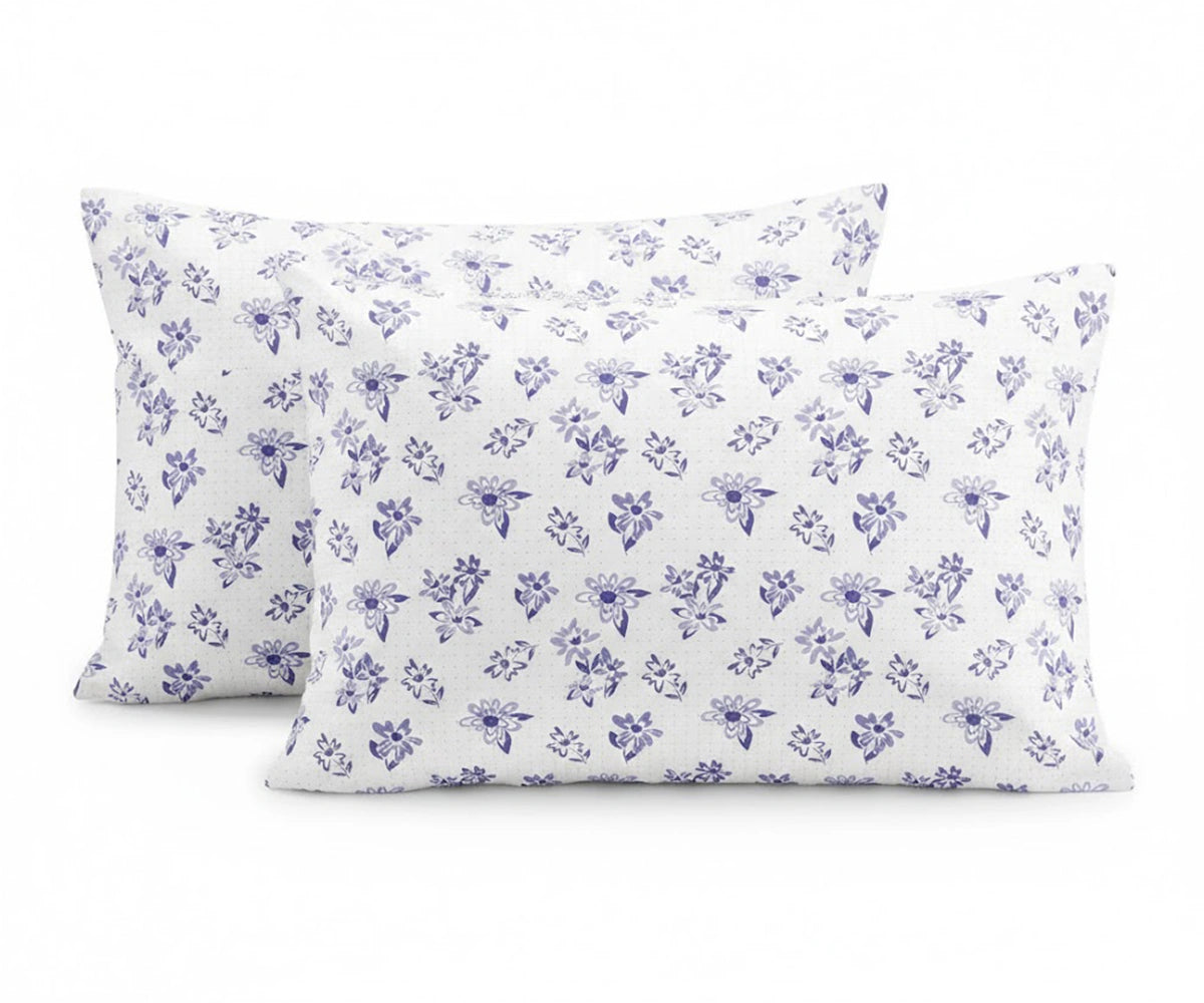 printed linen sheet set with matching pillowcases in blue floral design, lightweight and moisture-wicking