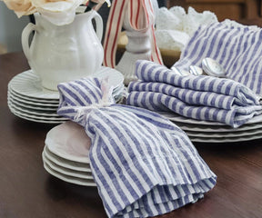 Luxury blue pinstripe linen dinner napkins designed for upscale dining tables, weddings, and formal entertaining