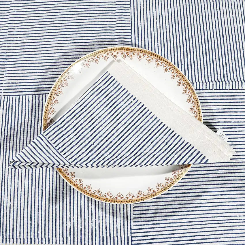 Set of 4 blue cotton cloth napkins with striped block printed design, 20x20 inches, eco-friendly and reusable, ideal for dinner or everyday use.