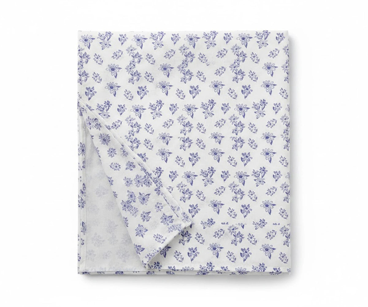 Deep pocket blue percale linen fitted sheet with floral print, secure fit for thick mattresses