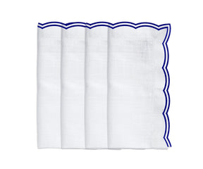 Royal blue scalloped cotton napkins paired with matching placemats