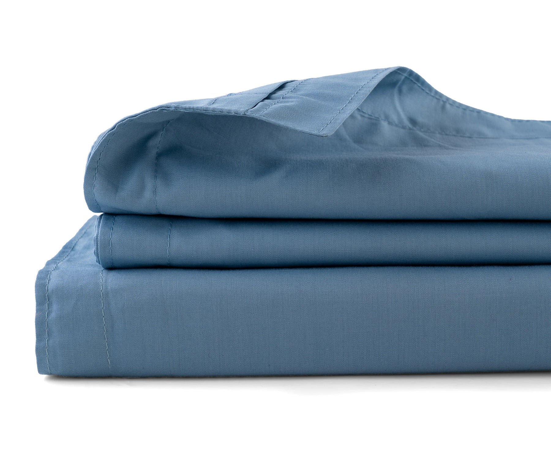 Folded light blue cotton flat sheet highlighting soft finish and elegant weave