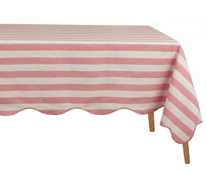 Pink and white striped tablecloth on rectangular table