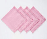 Fringed cotton cloth napkins with decorative edges, made from soft durable fabric and designed for reusable everyday dining and elegant table settings.