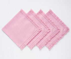 Fringed cotton cloth napkins with decorative edges, made from soft durable fabric and designed for reusable everyday dining and elegant table settings.