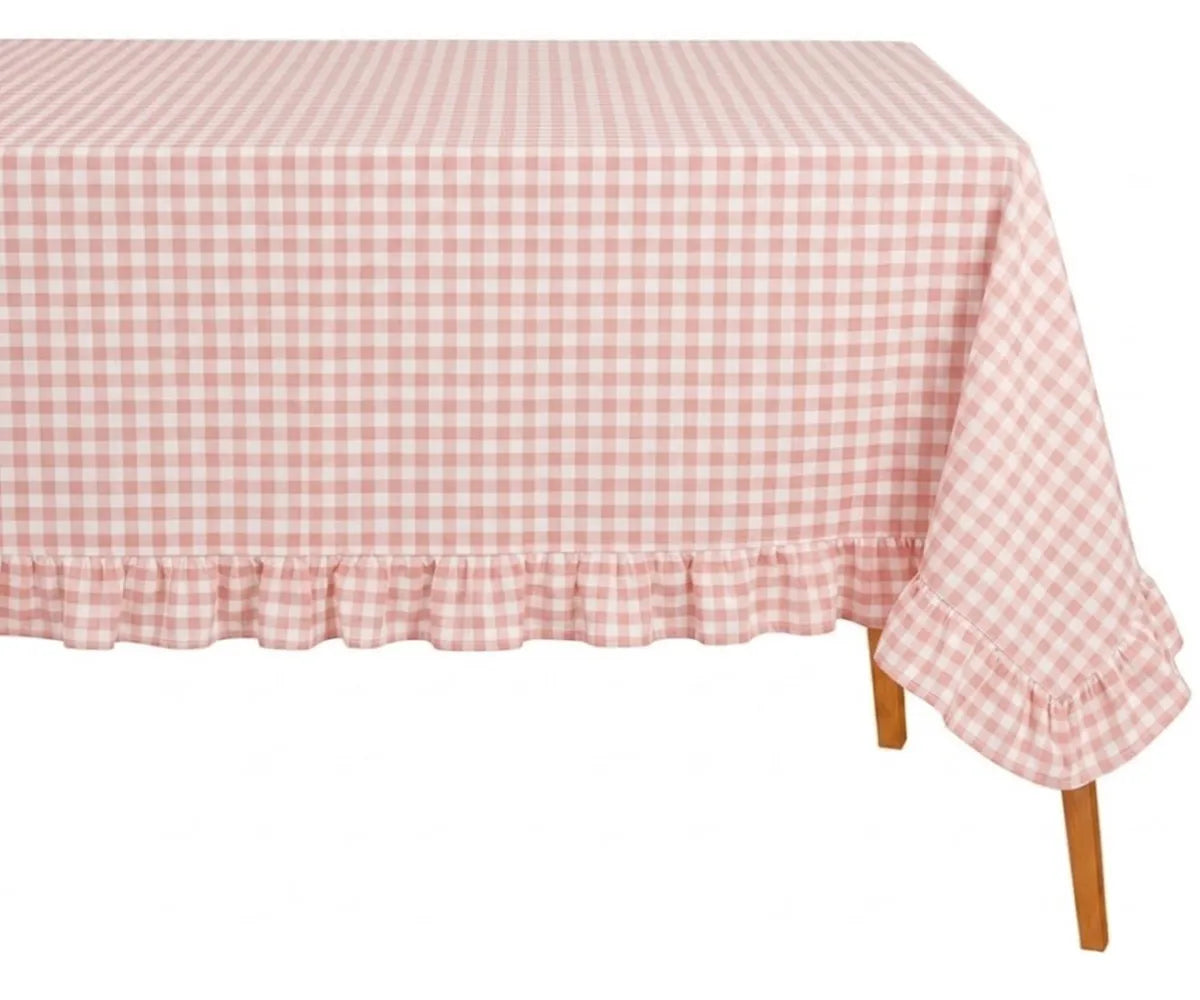 Breathable cotton gingham tablecloth with ruffle detail creating a cozy and inviting dining setup