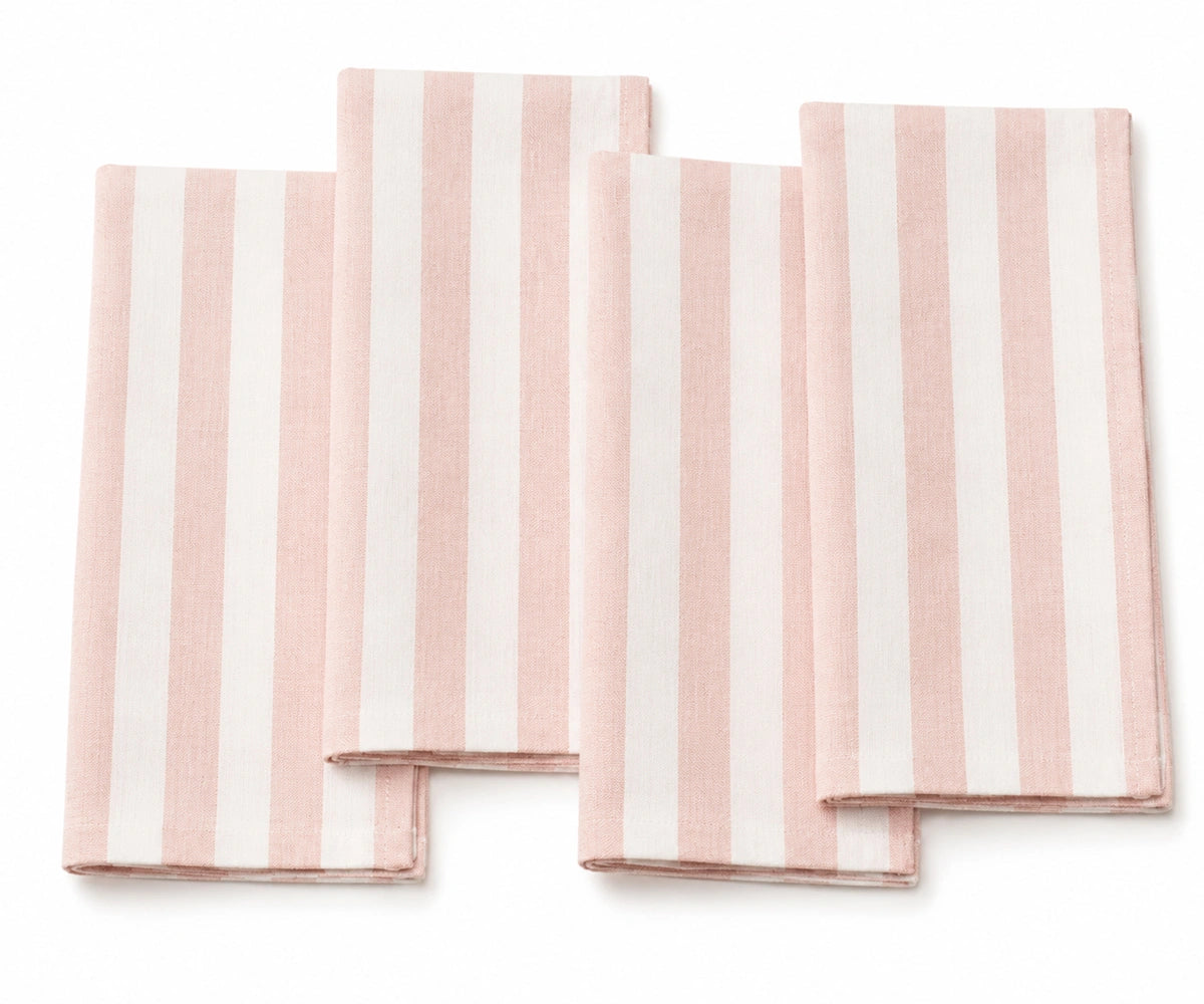Blush striped dinner napkins made with 100% cotton, offering a soft, elegant look for casual and special table settings.