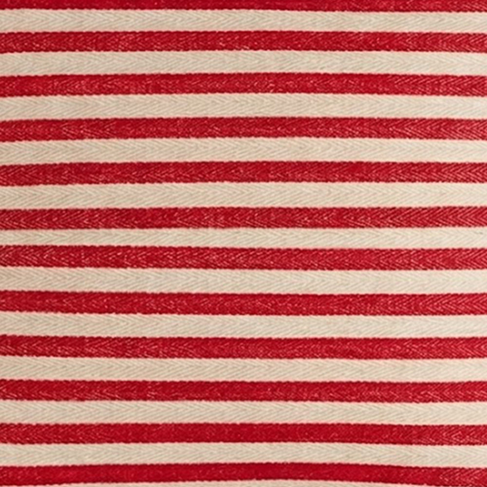 Close-up texture of red and beige striped fabric showing a detailed herringbone jacquard weave with horizontal stripes.