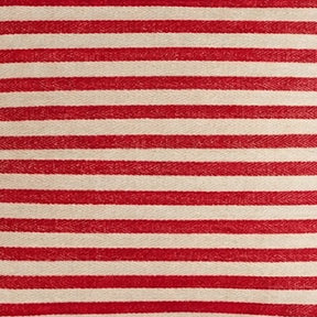 Close-up texture of red and beige striped fabric showing a detailed herringbone jacquard weave with horizontal stripes.