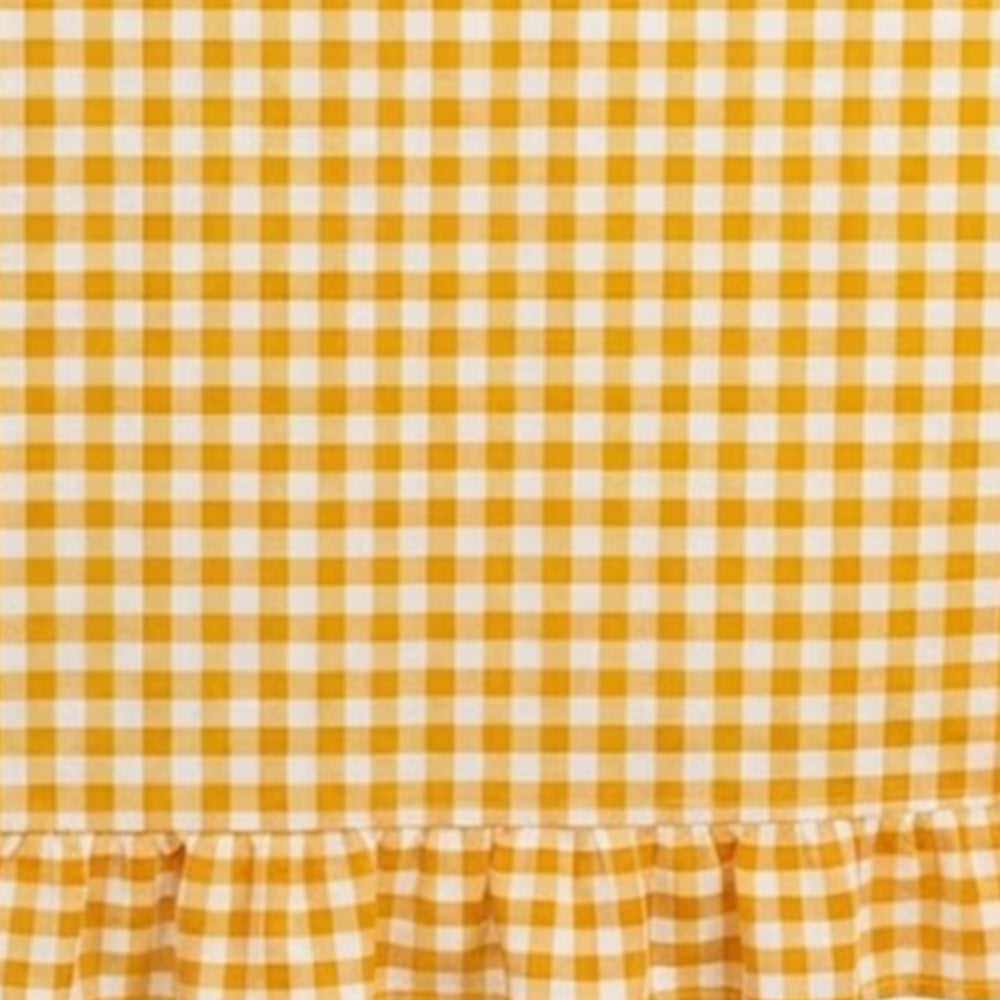 Fabric swatch of cotton gingham tablecloth showing breathable weave and soft texture up close