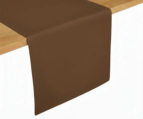 Brown cotton table runner styled on dining table, earthy tone table décor