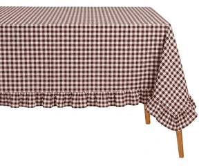 Vintage inspired gingham tablecloth with elegant ruffle trim for a warm and timeless tablescape