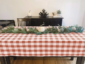 Transform your outdoor dining with checkered and red tablecloths, adding style and charm to your gatherings and events.