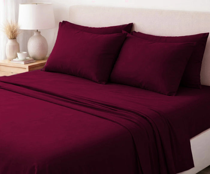 Burgundy linen bedsheets styled in a modern bedroom, breathable 100% linen bedding set for cozy everyday bedroom decor and comfortable sleep