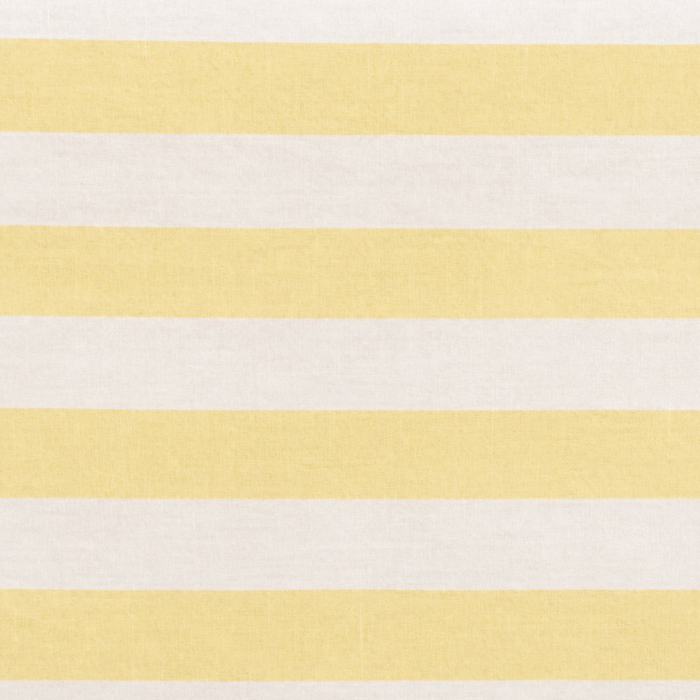 Close-up fabric swatch of a yellow and white cabana stripe cotton table napkin