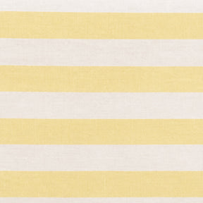 Close-up fabric swatch of a yellow and white cabana stripe cotton table napkin