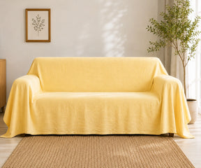 Butter yellow solid cotton linen sofa cover adds a warm decorative accent while helping refresh and protect everyday couches and sofas